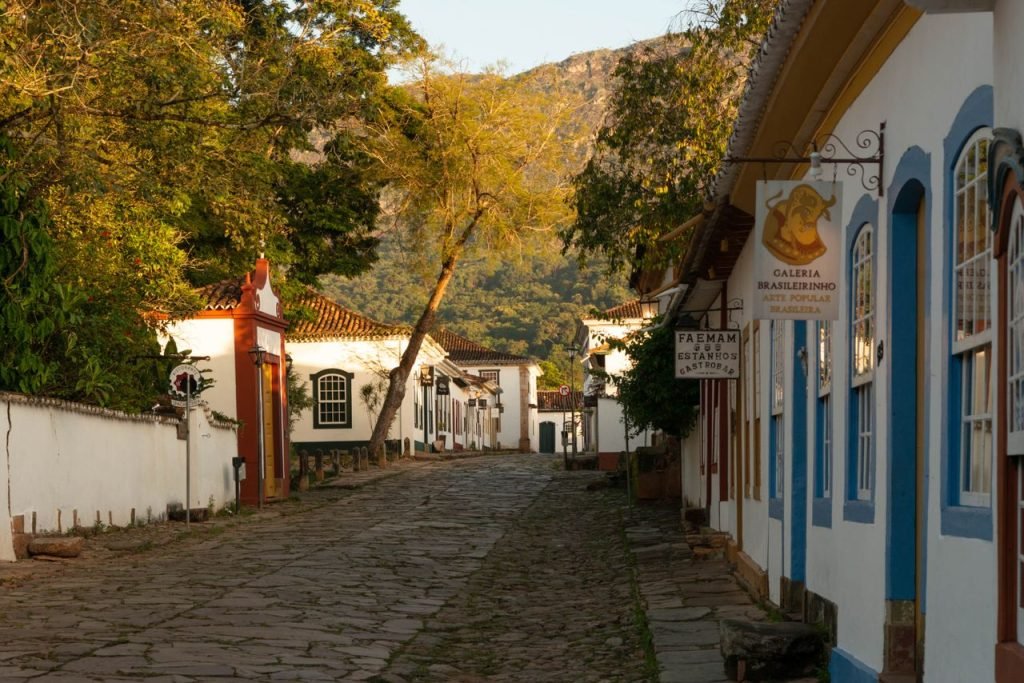 Explore the cobblestone streets of Paratys historic district, featuring colorful colonial architecture.